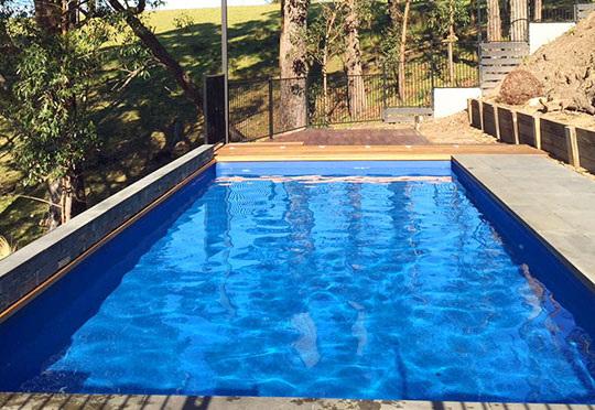 above ground pool sloping sites